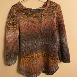 Fall themed sweater with swooped bottom